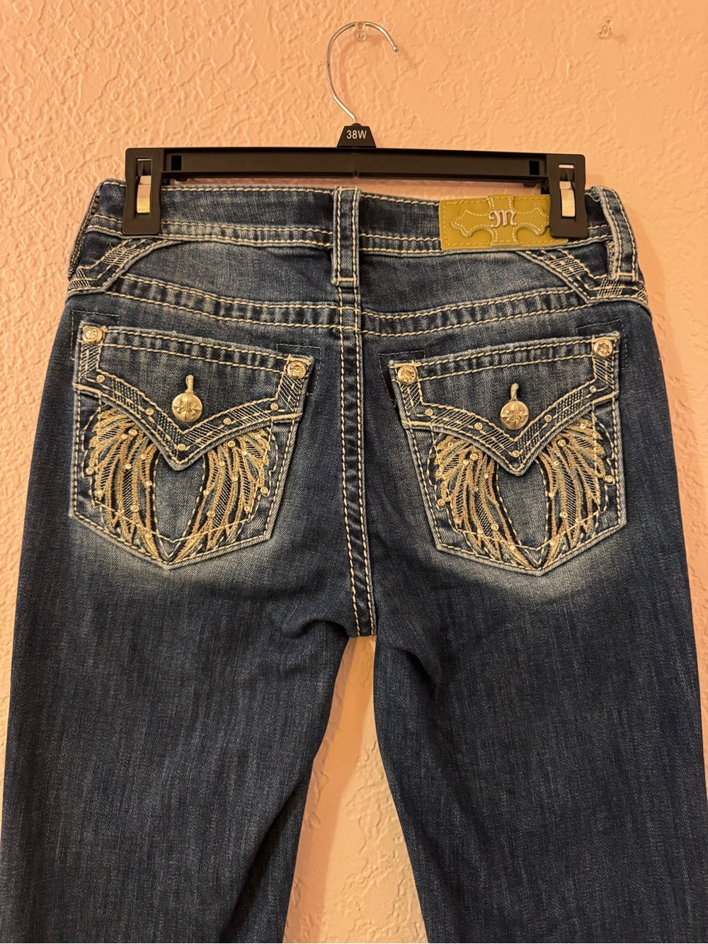 Miss Me mid rise bootcut jeans with wing embroidery
